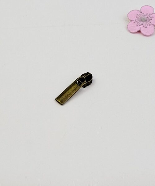 Dragkedjslöpare mörk antik