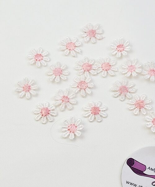 Brodyrblommor vit med rosa mitt