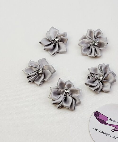 Tygblomma med sten Grå