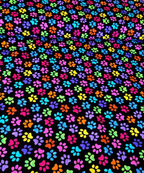 9328 Bomullstyg färgglada tassar